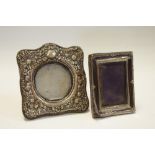 Two silver easel frames,