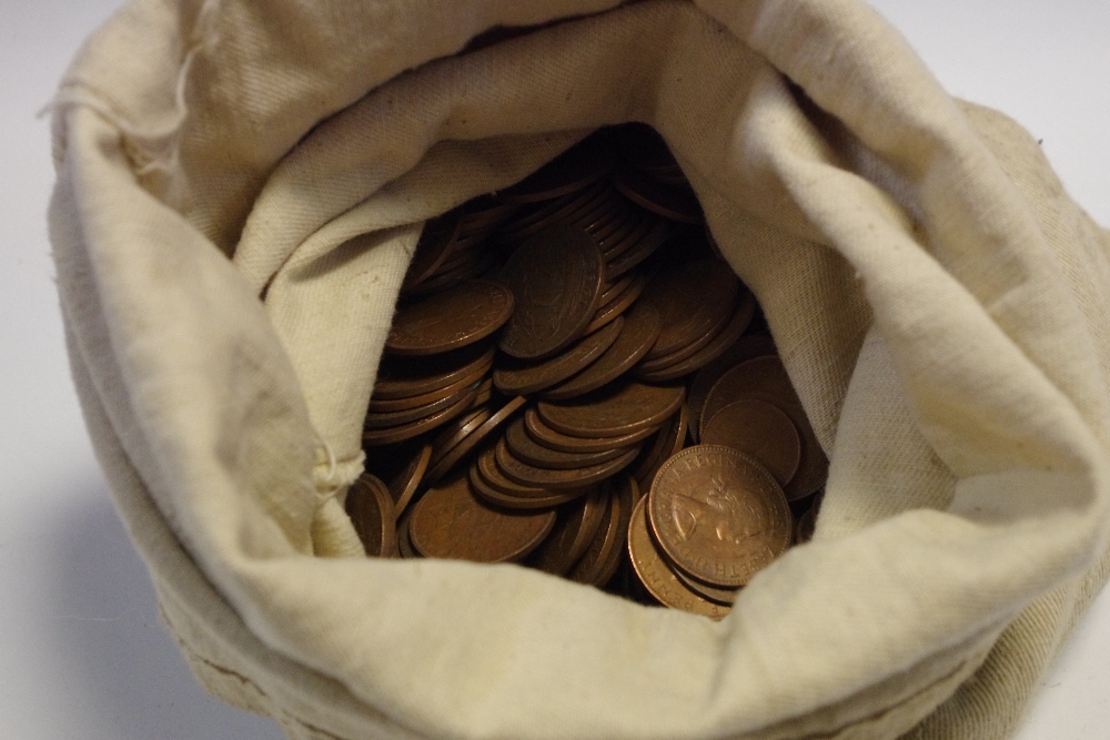 A large quantity of early 20th century half pennies; Metal detecting finds - spurs,