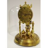 A Hermle brass anniversary clock, of small proportions,