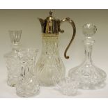 An EPNS mounted claret jug; a cut glass decanter,another, a vase,