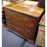 A flame mahogany chest of drawers, beaded top, brushing slide with baize writing surface,