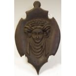 A 19th century carved panel,