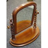 A Victorian mahogany dressing table mirror, bobbin turned supports, arched base c.