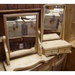 A bleached mahogany dressing mirror, rectangular plate, shaped uprights,