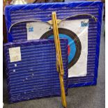 A scratch built crossbow (unfinished) with two archery targets