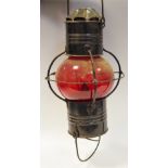 A ships red globe onion lamp