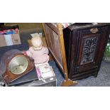 A Victorian purdonium; a wooden fire screen; a mantel clock; A celluloid baby doll;