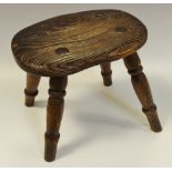A 19th century elm stool