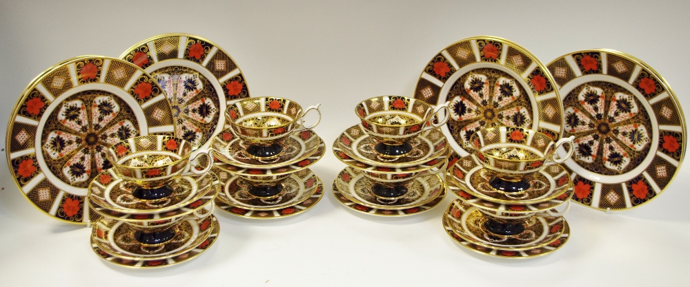 A Royal Crown Derby 1128 pattern part tea setting for 8 comprising tea cups, saucers,