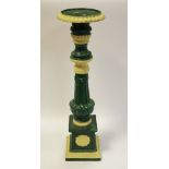 A heavy gauge cast iron candle stand with Yorkshire rose emblem to base,