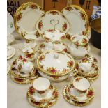 Royal Albert Old Country Roses dinner plates; teapot; cake stand;