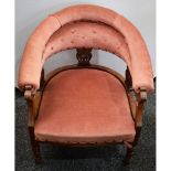 A late 19th early 20th century mahogany tub chair, open arm,