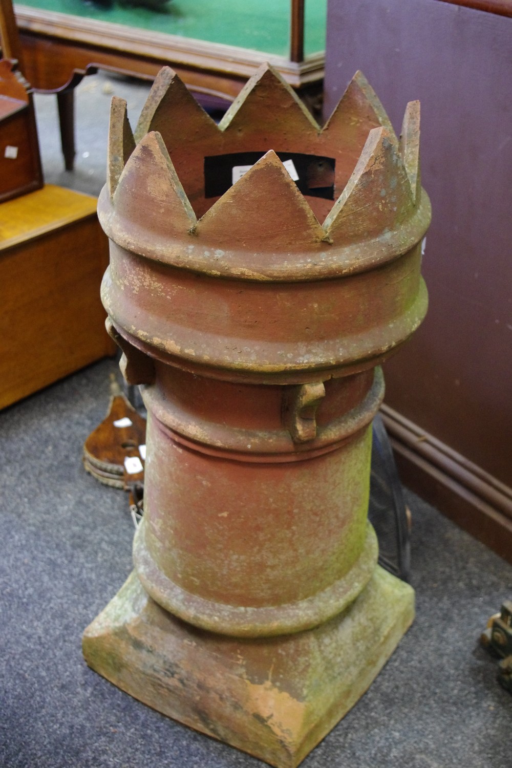 An early 20th century terracotta King's chimney pot, c.