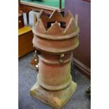 An early 20th century terracotta King's chimney pot, c.
