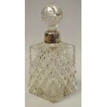 An Edwardian silver mounted hobnail-cut clear glass scent bottle,