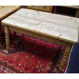 A country pine kitchen table, plank top, single drawer to frieze, turned legs, circa 1900.