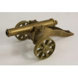 An early 20th century cast brass desk model signal cannon, 11.