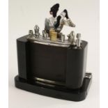 An Austrian Art Deco novelty cigarette dispenser, The Bartender, by Sudre,