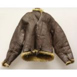 A Fleet Air Arm sheep skin jacket, label dated 1943,