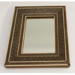 An Indian sadeli marquetry looking glass, rectangular mirror plate,