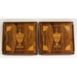 A pair of 'Sheraton Revival' rosewood and marquetry waiters, each inlaid with a Neo-Classical urn,
