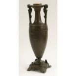 A 19th century Grecian Revival brown patinated bronze table lamp, of loutrophoros form,