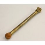 A Victorian brass tipstaff or truncheon, crown finial, turned boxwood pommel, 24.