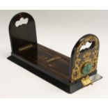 A Victorian malachite and gilt brass mounted coromandel Betjemann's patent self-closing bookslide,