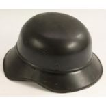 World War II - A Third Reich Nazi German M34 Feuerwehr 'salt shaker' civic stalhelm helmet,