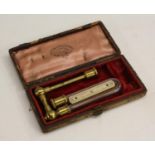 A Victorian lacquered brass and glass pressure gauge, probably for a gas meter,
