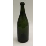 A 19th century green wine bottle, kick-up base,