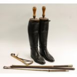 Country Pursuits - a pair of black leather riding boots,