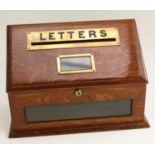 A Victorian oak country house post box,