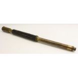 A 19th century brass telescope, with single draw and sliding shade,