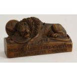 A Black Forest cabinet carving, of the Lion of Lucerne,