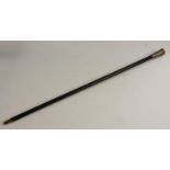 A silver coloured metal mounted gentleman's walking cane,