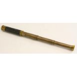 A 19th century lacquered brass three-darw pocket telescope, leather grip, push-fitting lens cap,