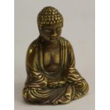 A Chinese bronze Buddha, seated in meditation,