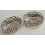 A pair of 19th century enamel gambling counter dishes,