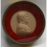 A 19th century wax portrait roundel, depicting Napoleon Bonaparte, bust length, facing to sinister,