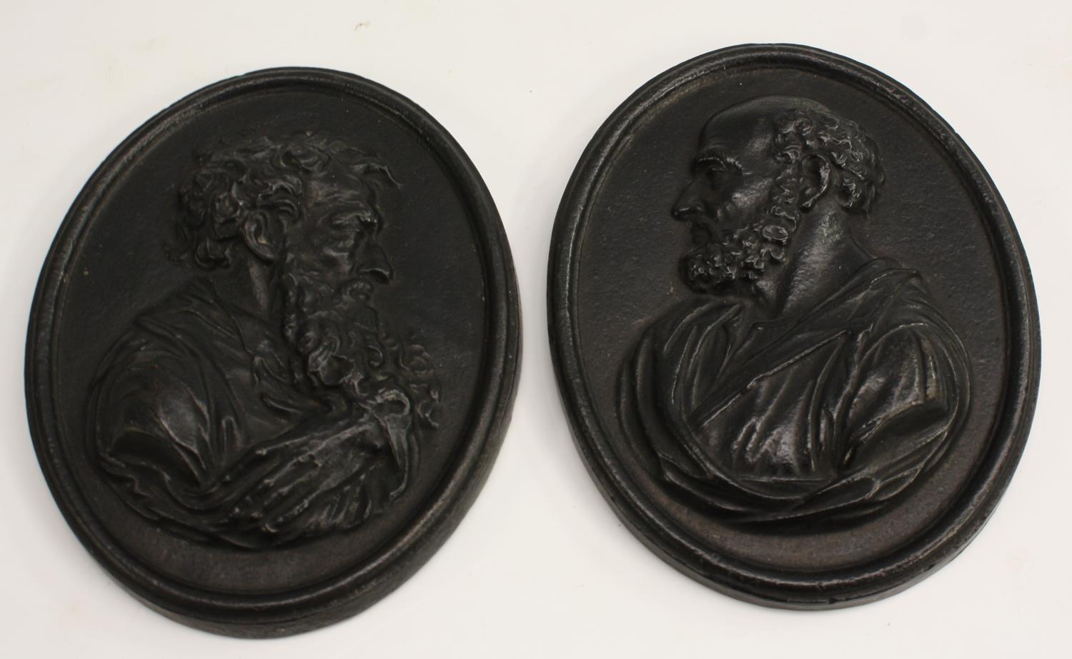 A pair of 19th century Grand Tour cast iron oval portrait plaques,