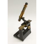 A 19th century brass and black painted vernier microscope,