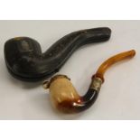 An Austrian silver-gilt and amber mounted meerschaum pipe, hinged cover, 17cm long, c.