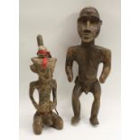 Tribal Art - an African figure, standing,