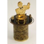 An Art Deco novelty cigarette dispenser, as a bar tender, bust length,