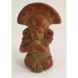 A South American terracotta figure, in the typical Pre-Columbian manner, 11.
