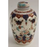 A 19th century faience ovoid jar and cover,