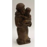 A North European oak carving, of St Anthony of Padua holding the Infant Christ, 41cm high,