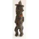 Tribal Art - a Teke reliquary power figure, he stands, with knees bent, aperture to stomach, 45.