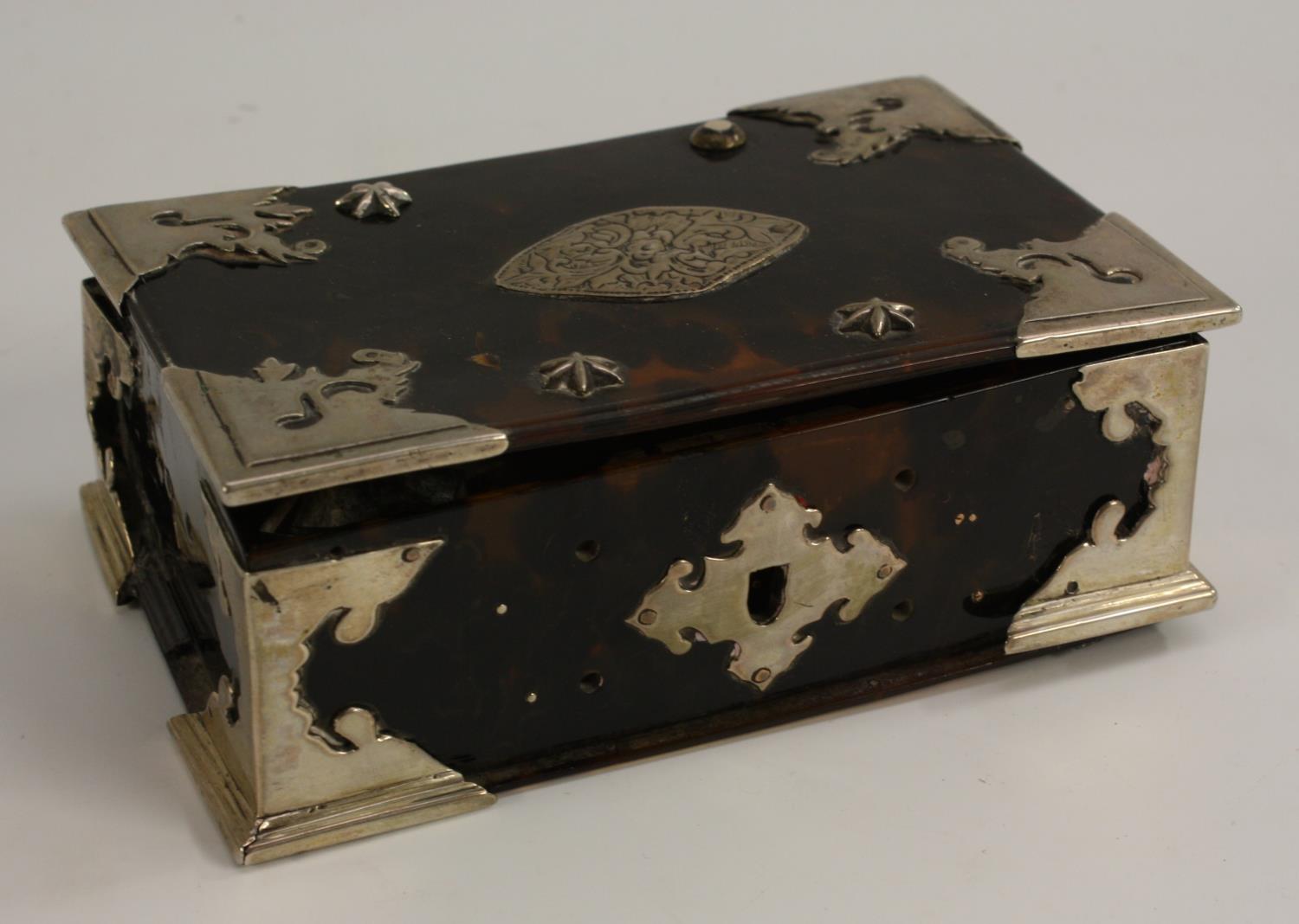 A 18th/19th century silver coloured metal mounted tortoiseshell table top spice box,